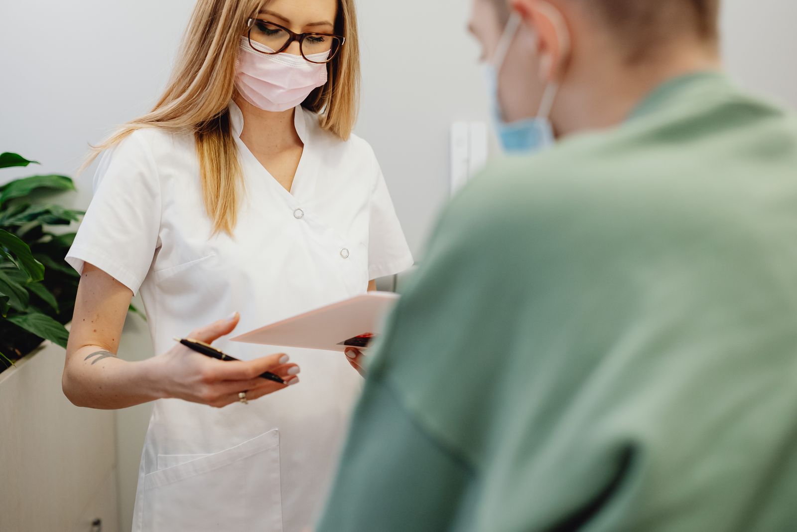 A Medical Staff at a Reception Desk